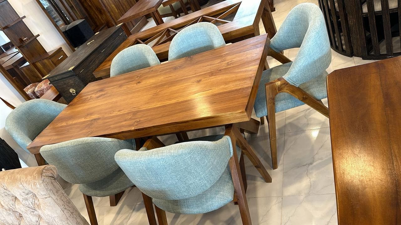 Solid wooden dining furniture displayed at St Marys Enterprises